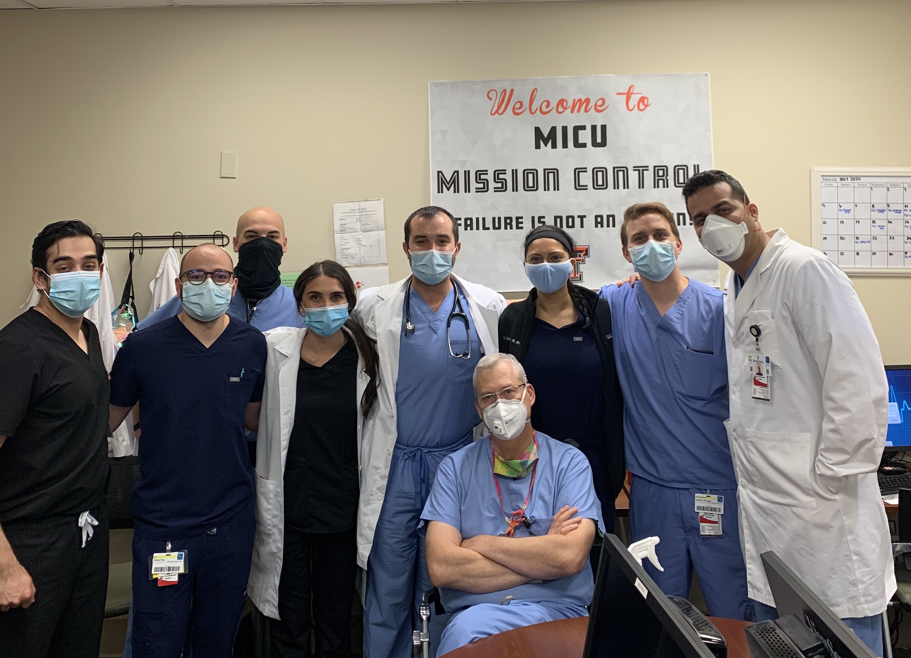 Victor Test and his staff pose for picture