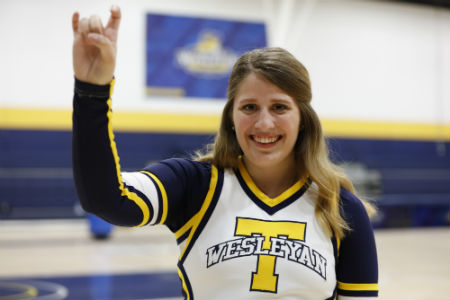 For Lyndsey Bessinger, senior management major at Texas Wesleyan University and Rams varsity cheerleader, cheering is more than a sport, it’s her metaphor for life. 