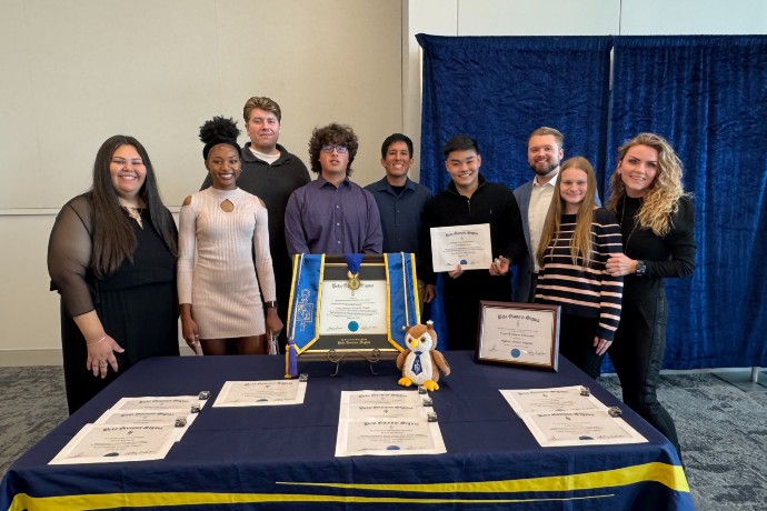 Beta Gamma Sigma members show off their Highest Honors award