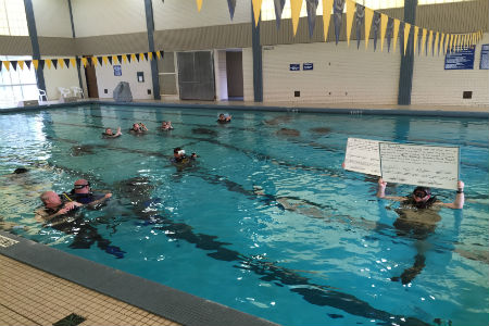 Don't miss the country's only underwater graduation right here on campus! Scuba minors will get 