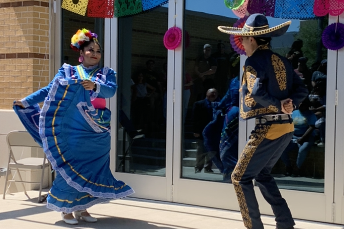 Texas Wesleyan students in traditional costume perform ballet folklorico as part of the hispanic heritage month kickoff celebration