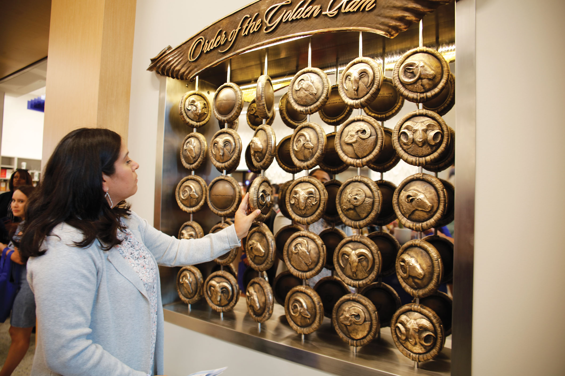 woman turning donation markers in University Center