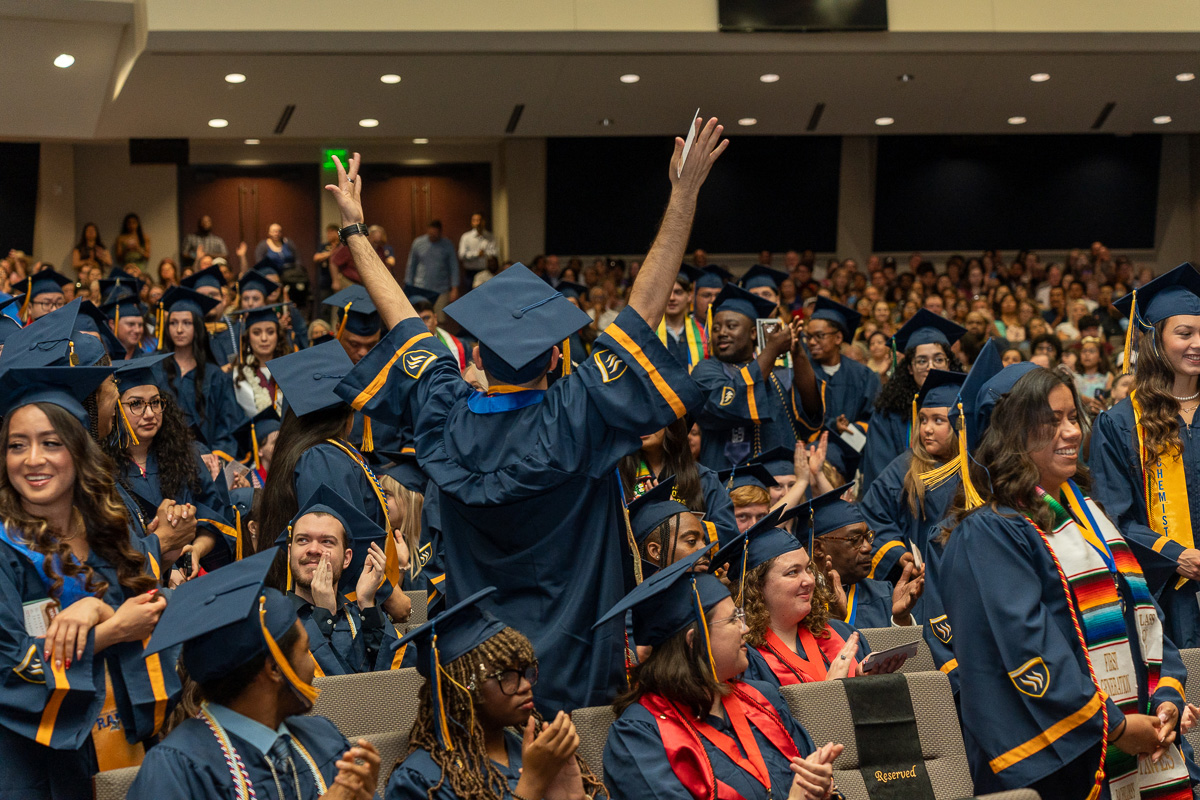 cheering graduates