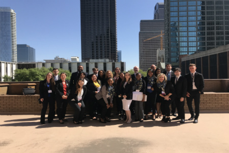 Chalon Anderson (gray jacket) and the Enactus team at the Dallas Regional competition.