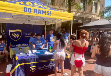 Students and Staff at the TXWES booth in downtown Fort Worth for the Michelada Festival.