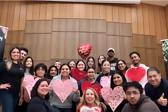 Students Holding Up Hearts