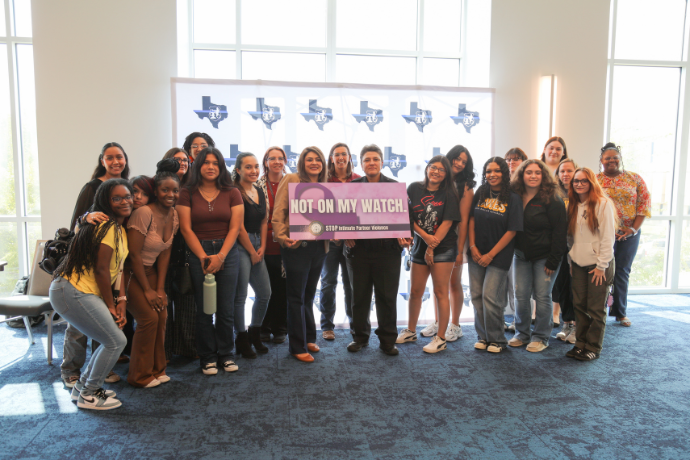 Women of Law Enforcement Speakers Group Photo with Logo Backdrop