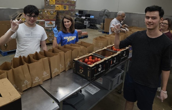 President Messer working at TAFB with students
