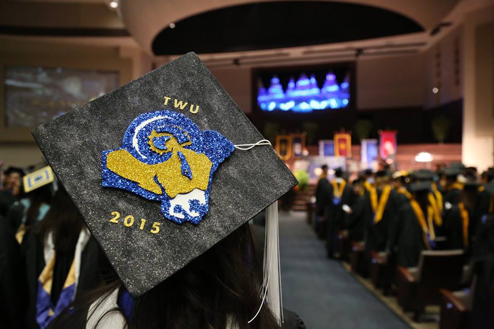 Mortar board with ram at graduation ceremony