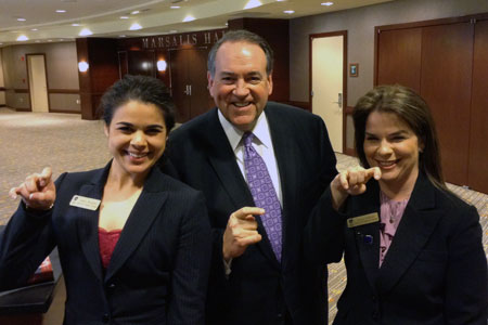 Perennial GOP presidential hopeful Mike Huckabee with Texas Wesleyan Hatton Sumners Scholars Abbey Borghee and Misty Wilkins.