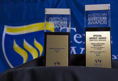 The Fort Worth chapter of the American Advertising Federation awarded Texas Wesleyan University with two gold awards and one silver award for its “Smaller. Smarter.” campaign at the 2015 Addy Awards last Friday.